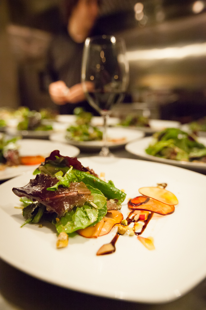 Salad being plated at Roux 30A