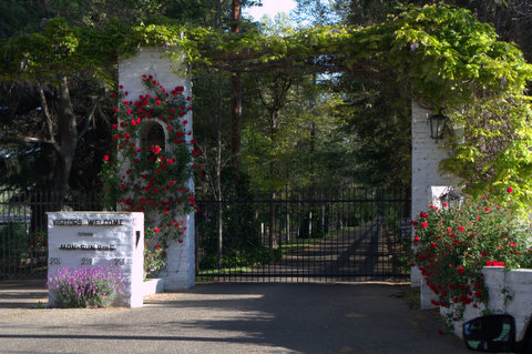The picturesque entrance to Flag Is Up Farms—visitors welcome at the Monty Robert's Join-Up Program