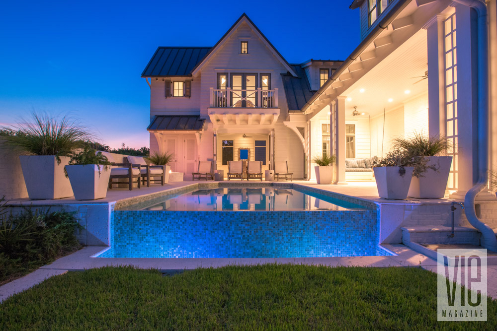 House at night with pool