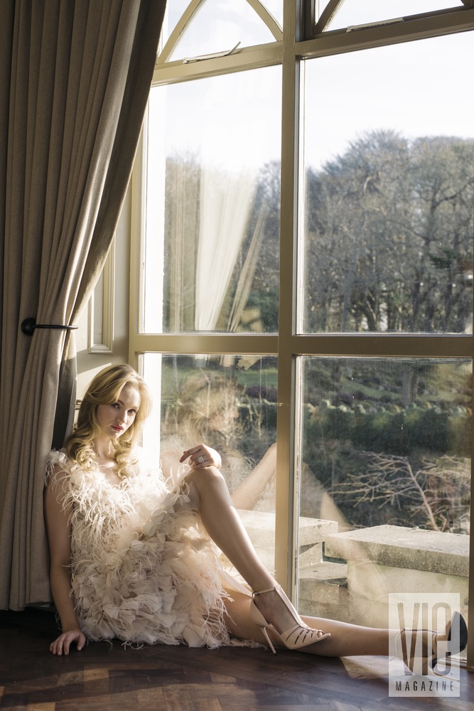Irish model Clara McSweeney in front of a window at Ballynahinch Castle