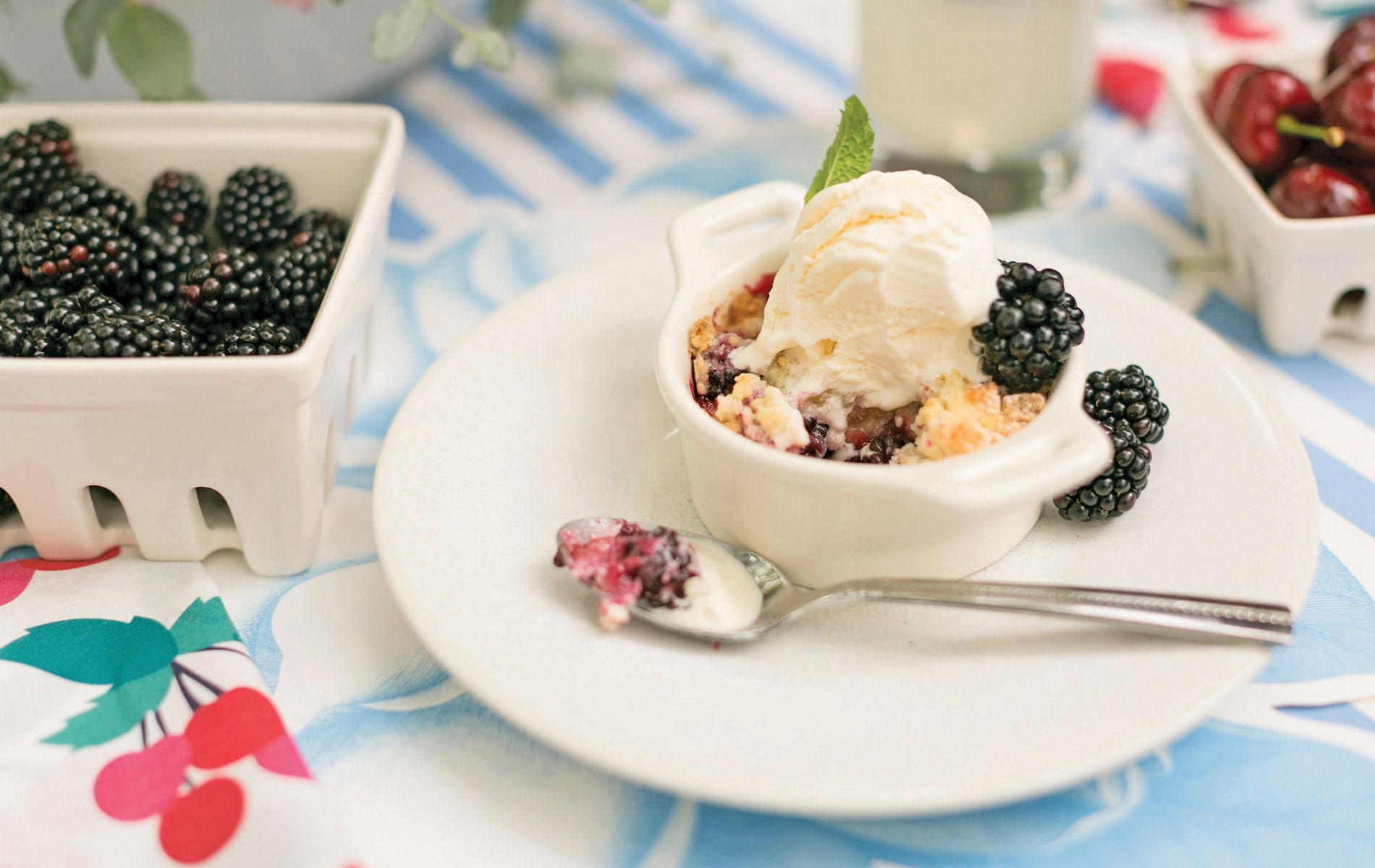 Elisabeth's black berry cobbler with vanilla ice cream topped with fresh black berries