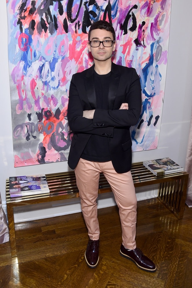 Fashion designer Christian Siriano attends the opening of his new store, The Curated NYC, hosted by Alicia Silverstone and sponsored by VIE Magazine on April 17, 2018, in New York City. Photo by Jamie McCarthy/Getty Images for Christian Siriano