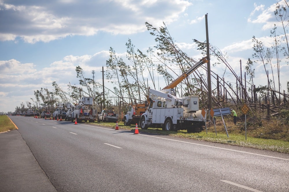 Linemen and working crews from all over the United States working on broken power lines from the destruction that Hurricane Michael caused