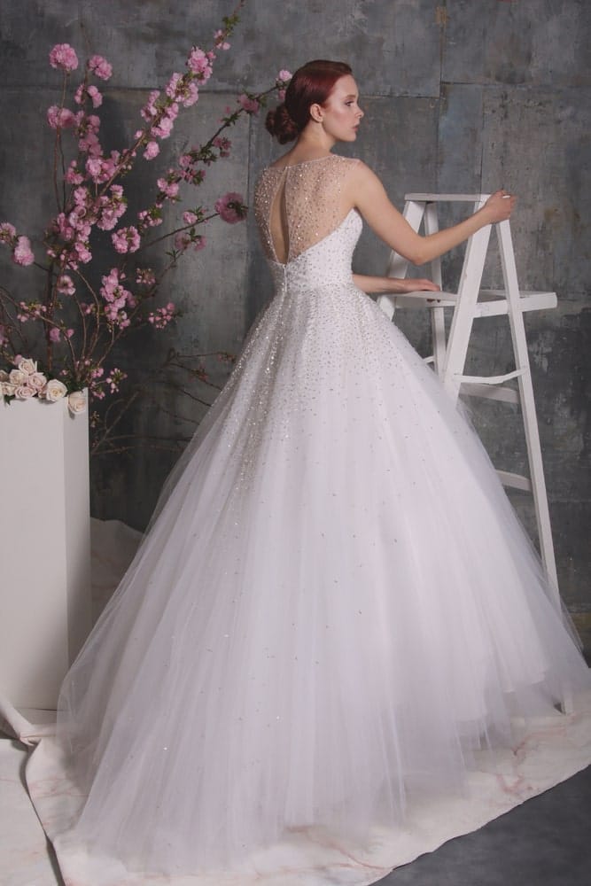 Girl modeling a wedding dress from the Christian Siriano Bridal line