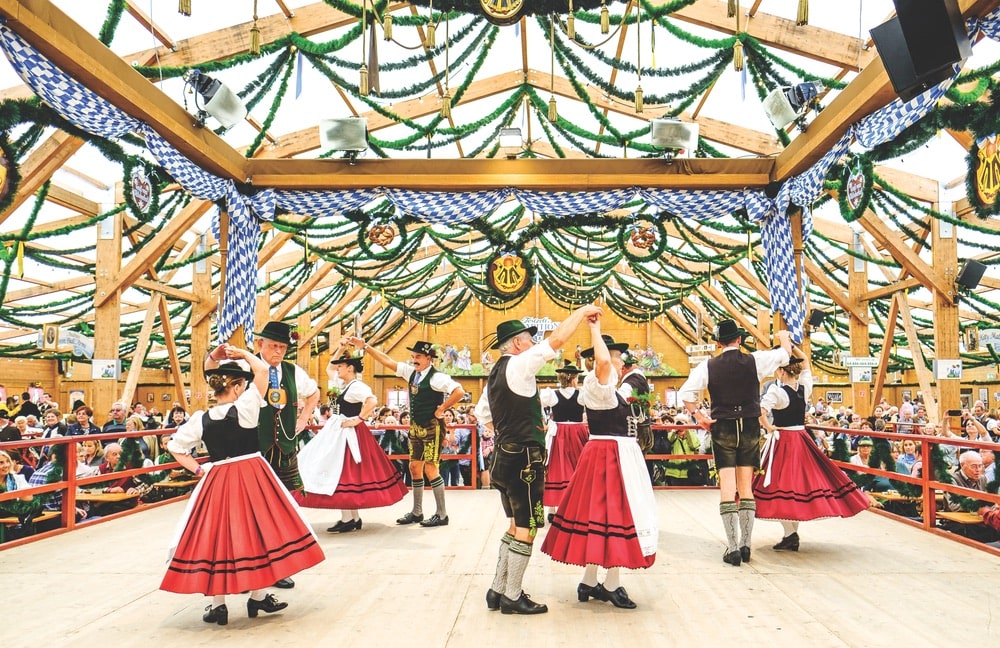 Munich’s Oktoberfest celebration is the world’s largest folk festival and the perfect chance to experience traditional German food, drink, and culture. Photo by FooTToo / Shutterstock
