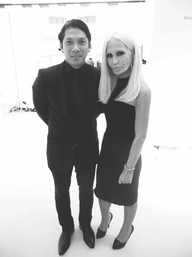 Black and white image of Robbie Antonio with Donatella Versace