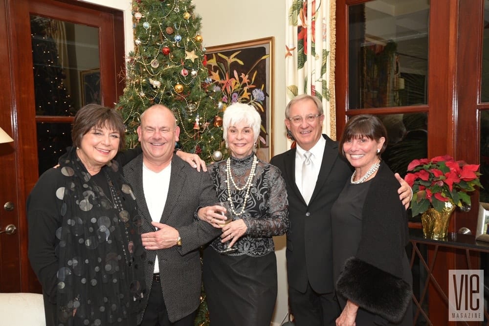 Linda Miller, Darrell Russell, Alda Sileo, Greg Bahr, and Jane Bahr attend Cafe Thirty-A's Christmas Charity Ball benefitting Caring and Sharing of South Walton, in Seagrove Beach, Florida on December 10, 2016