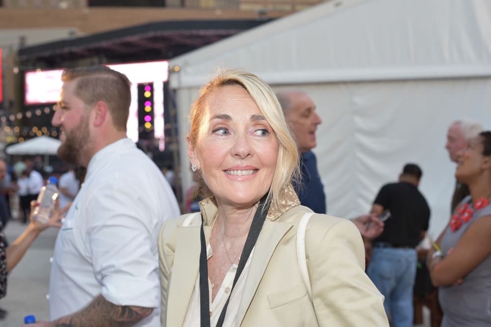 Lisa Burwell watching guests at the Boudin Bourbon & Beer 2016 charity event in New Orleans, Louisiana