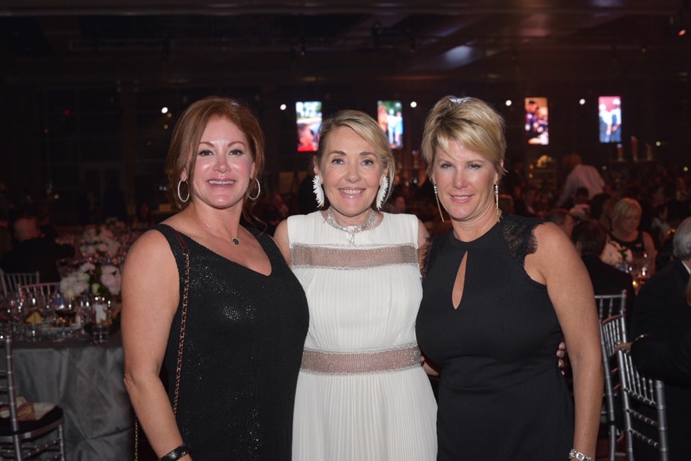 Pam Burden, Lisa Burwell, and Laurie Beck attend Emeril Lagasse Foundation’ Carnivale du Vin gala and charity wine auction at the Hyatt Regency New Orleans’ Empire Ballroom on November 5, 2016