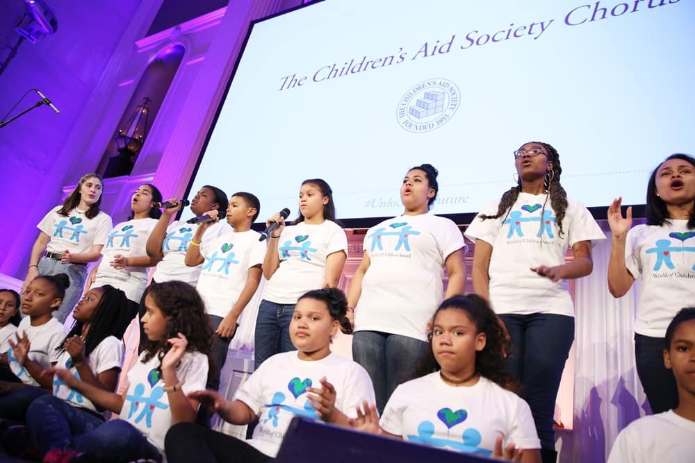 The Children's Aid Society Chorus peforms on stage during the World of Children Awards Ceremony