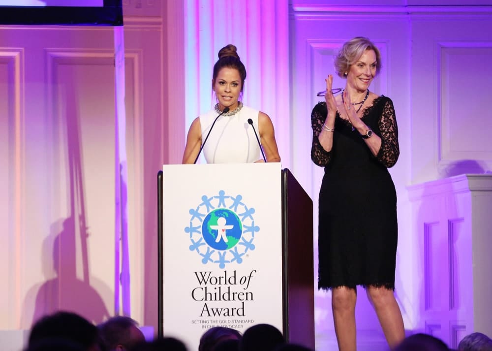 Actress Brooke Burke (L) and World of Children Award Co-Founder & 2016 Alumni Honors Co-Chair Kay Isaacson-Leibowitz appear on stage during the World of Children Awards Ceremony
