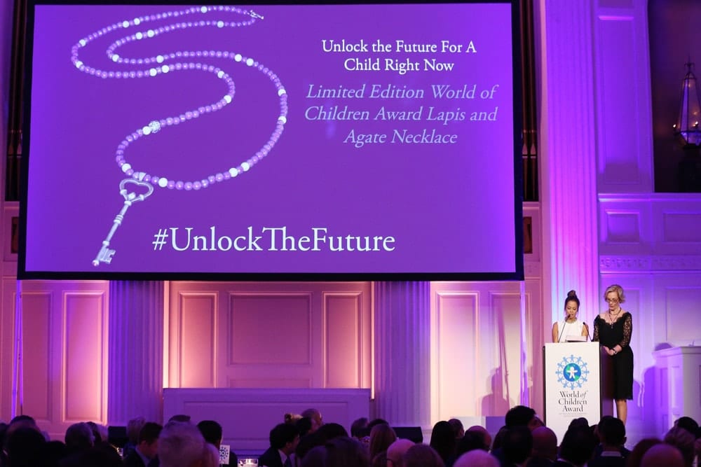Actress Brooke Burke (L) and World of Children Award Co-Founder & 2016 Alumni Honors Co-Chair Kay Isaacson-Leibowitz appear on stage during the World of Children Awards Ceremony