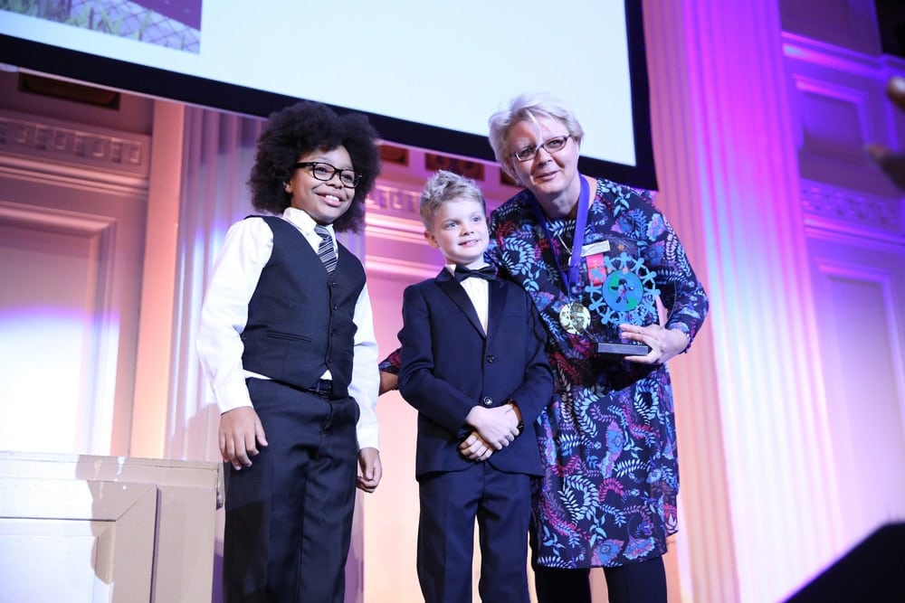 Honoree Dusica Popadic accepts an award on stage during the World of Children Awards Ceremony