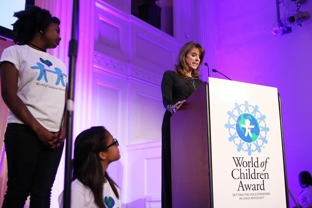 Lynn Naylor speaks on stage during the World of Children Awards Ceremony