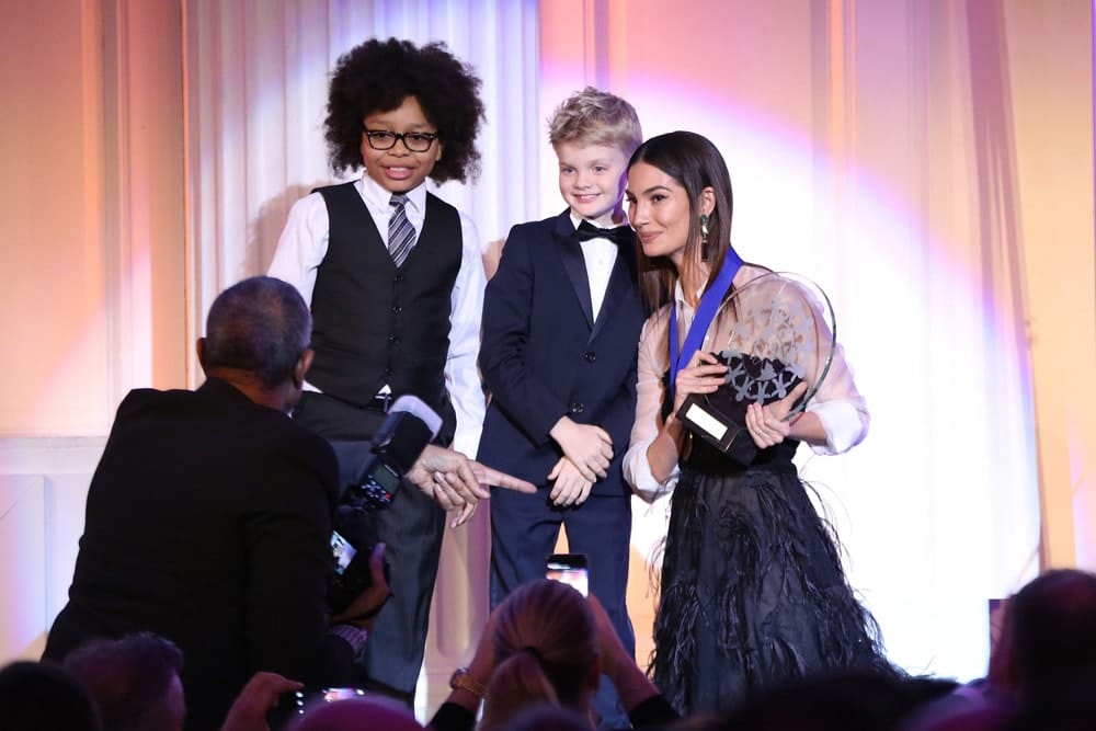 Model Lily Aldridge Followill accepts an award on stage during the World of Children Awards Ceremony