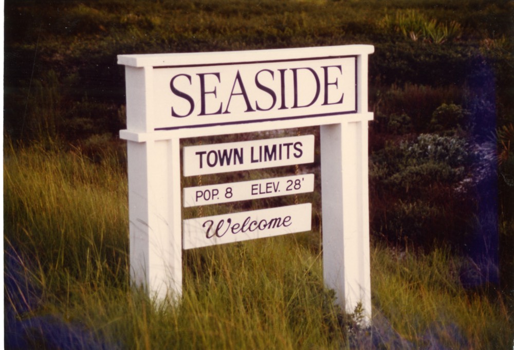 Photo Courtesy of The Seaside Institute Town sign in early 1980s. Seaside's population fluctuates with the seasons— locals used to count the dogs, too. 