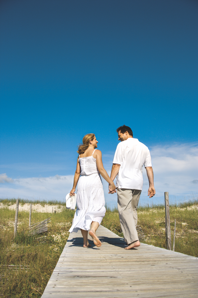 beach; couple; boardwalk