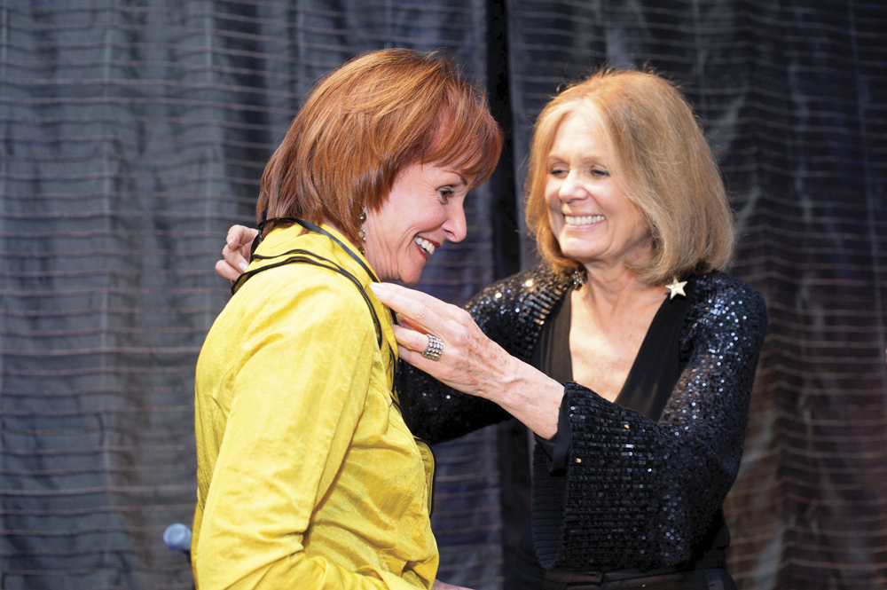 Jane Comer receives the Woman of Vision and Action Award from Gloria Steinem in 2010 at the Ms. Foundation’s Gloria Awards