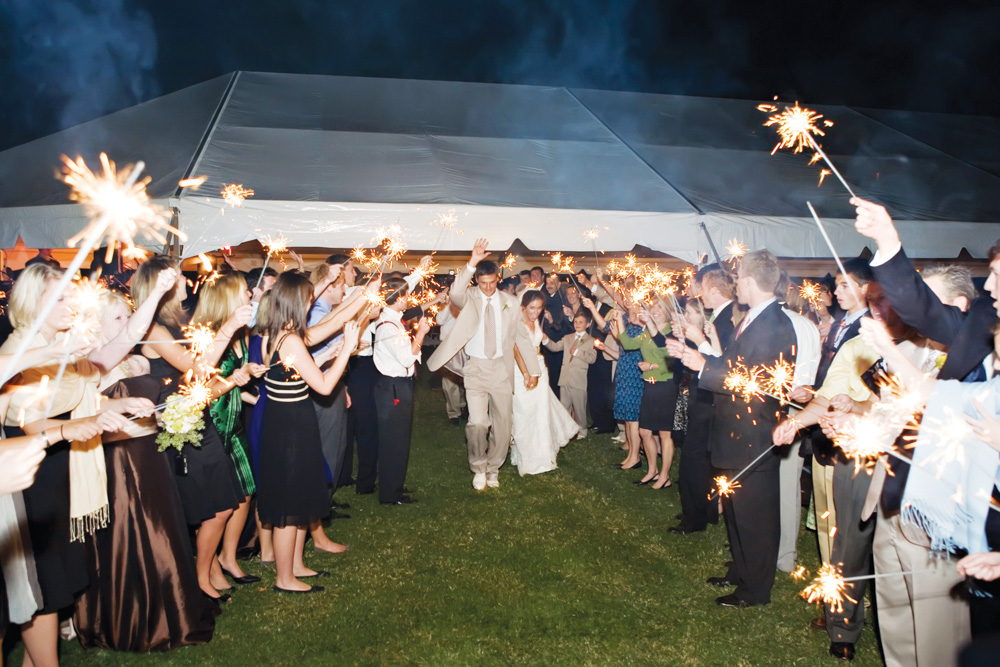 Bride and Groom exiting with sparklers at Vaughn and Tim Spanjer wedding Hamilton Place at Pursell Farms