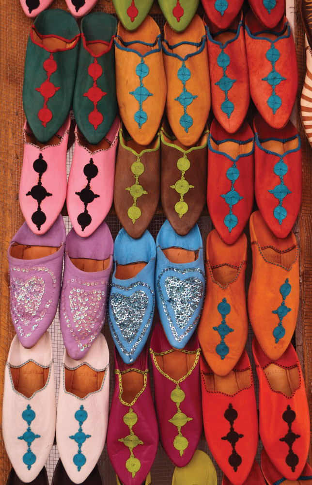 Colorful Moroccan slippers on display in shop