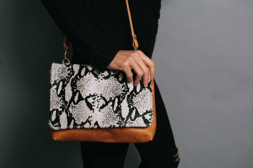 Ceri Hoover's snakeskin print and solid leather over the shoulder handbag