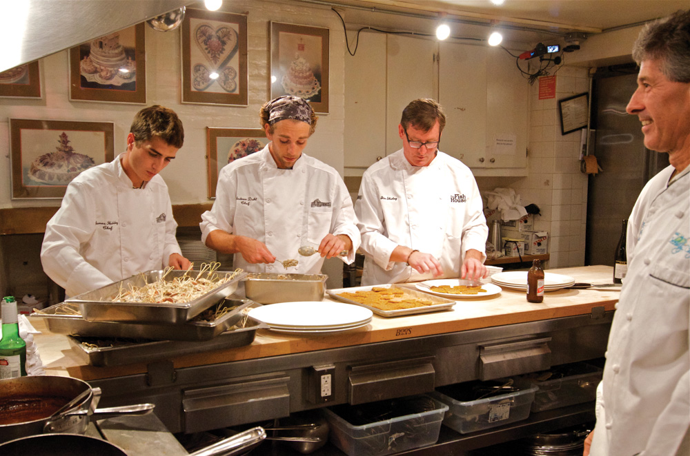 Chef Jim Shirley working with sous chefs at the James Beard House