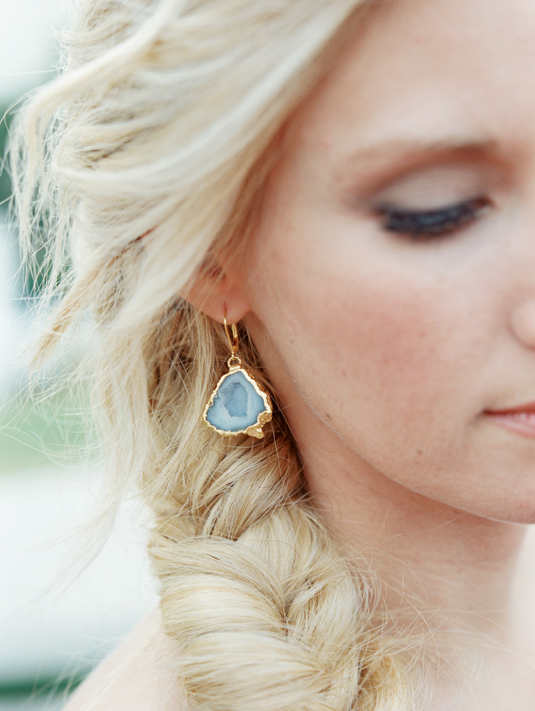 Bride with blue stone earrings