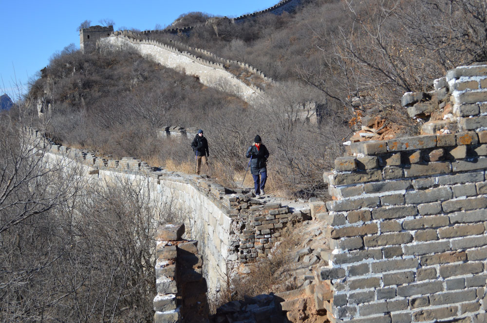 Couple hiking the Great Wall of China