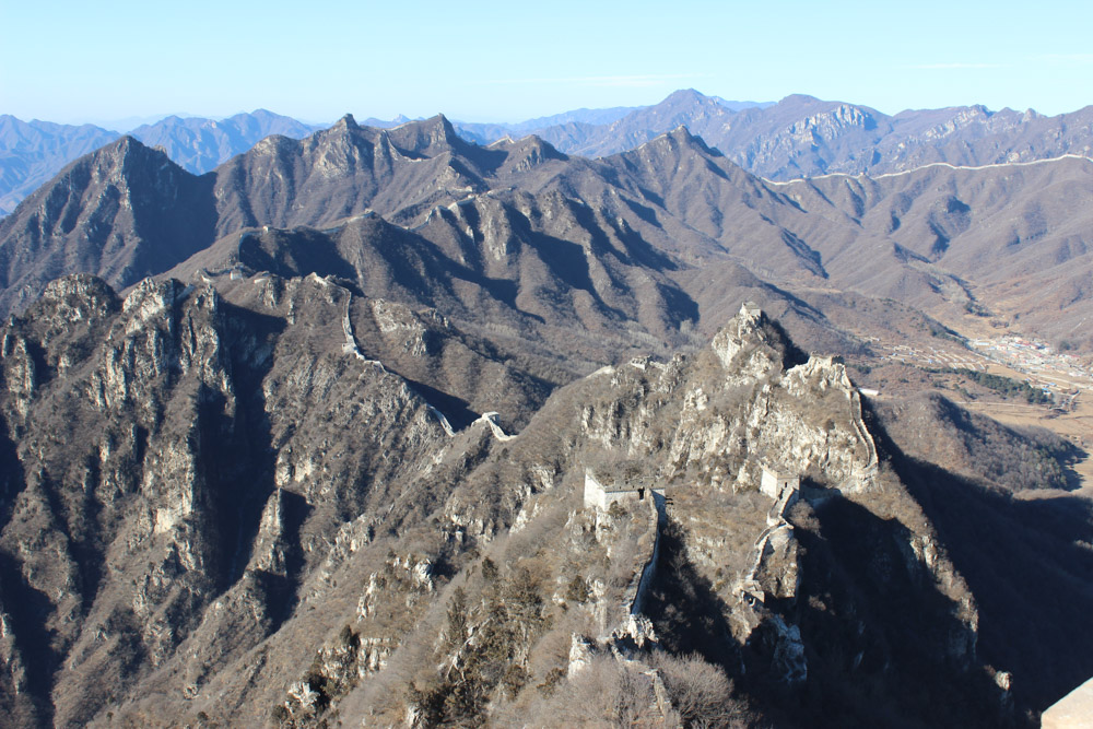 The amazing Great Wall endlessly crisscrosses the surrounding mountains as far as the eye can see.