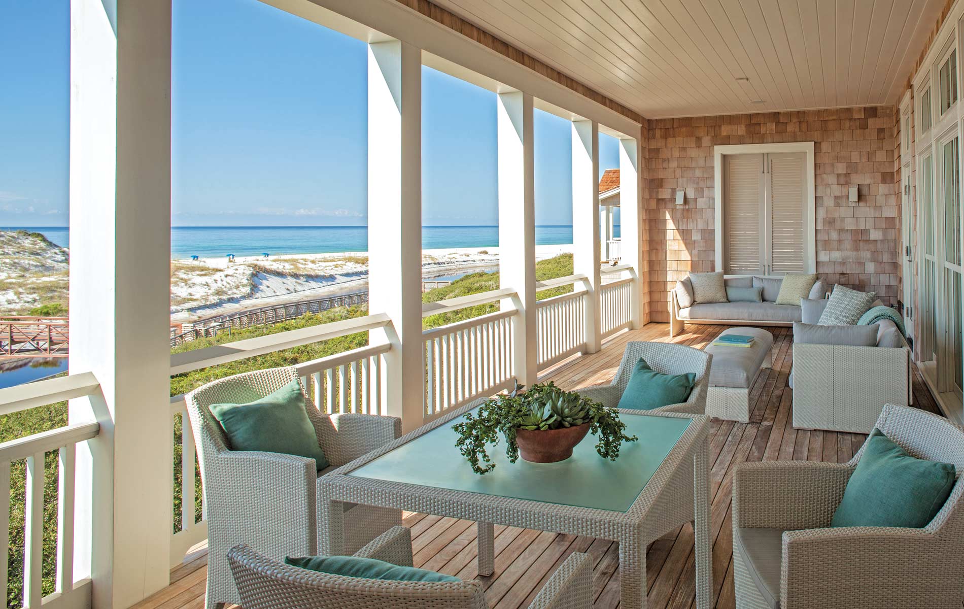 Deck with beach view and chairs