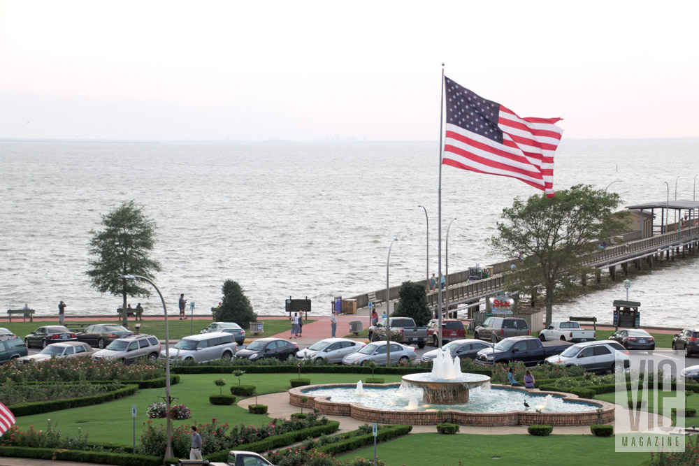 American flag waving in the wind at dock in Fairhope, Alabama