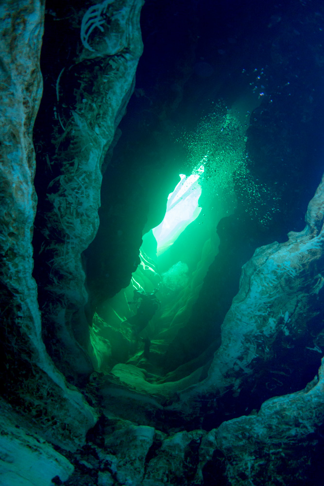 Underwater cave with diver 