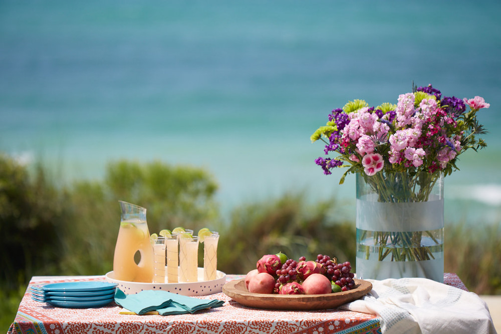 Beach with flowers and fruit 