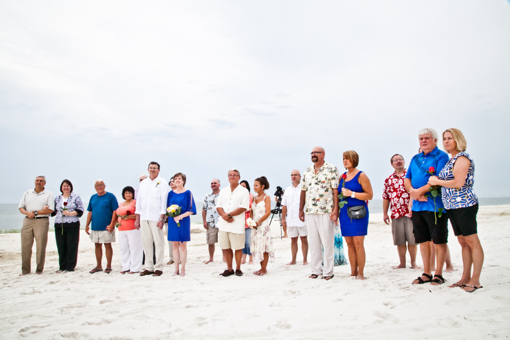Couples renewing their vows on the beach