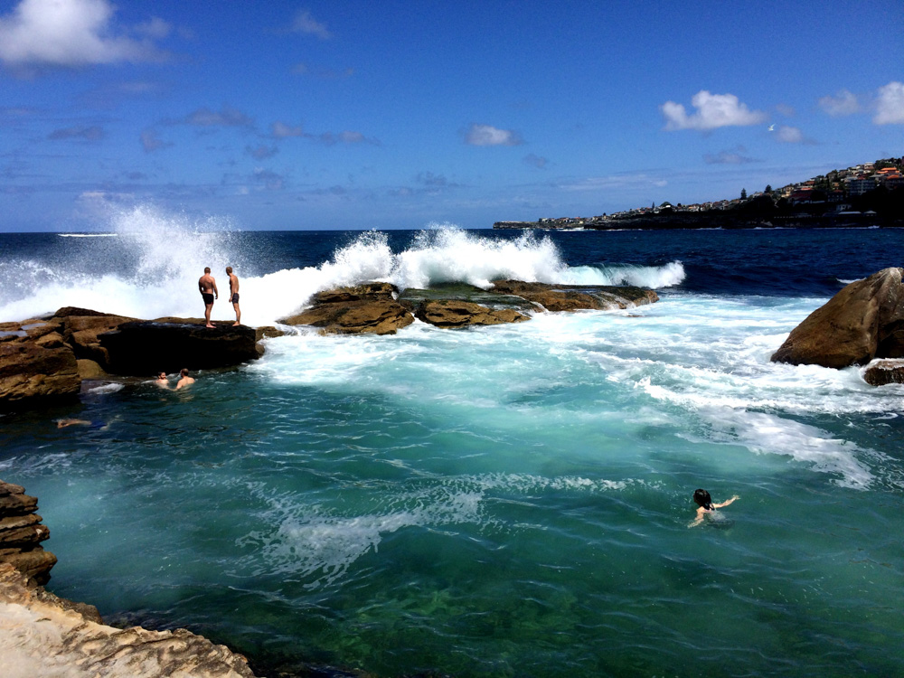 Swimming at the bogey hole at Coogee Beach. Sydney, Australia