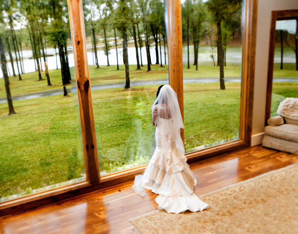 Bride looking out to lake
