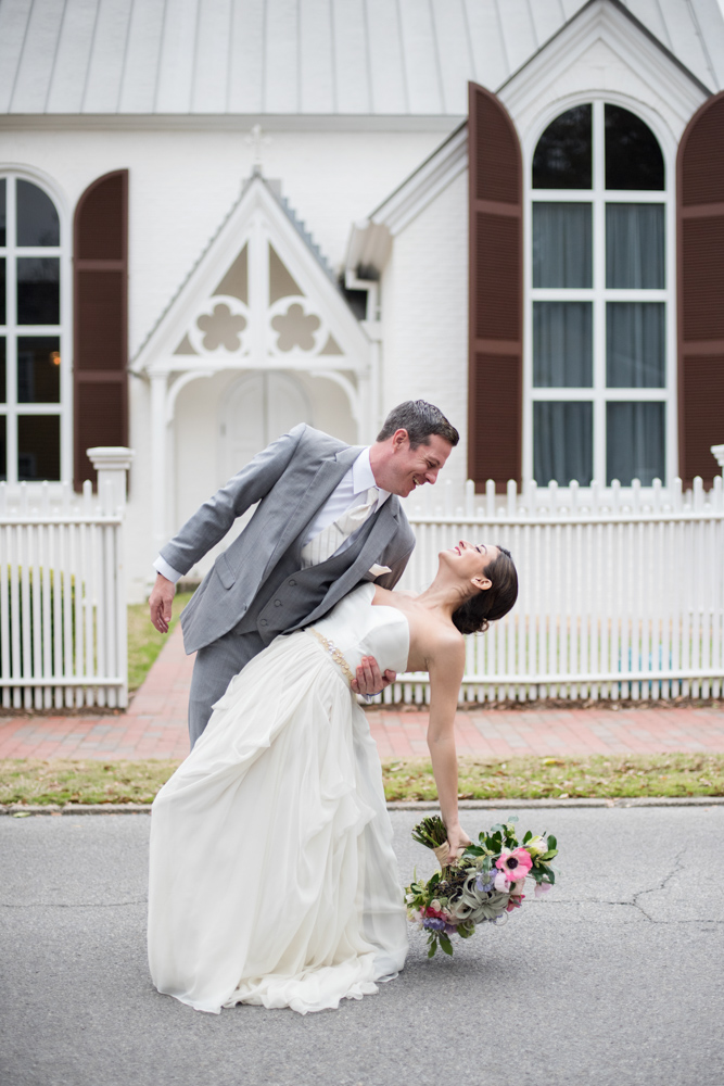 Wedding Event Specialists bride and groom in front of church. Photo by Melissa Wilson Photography