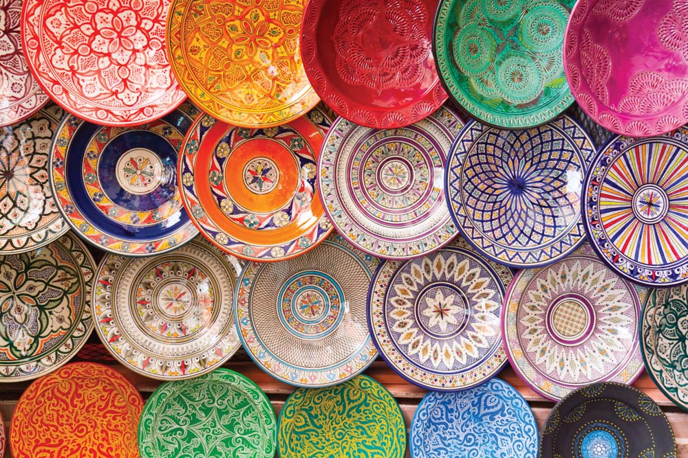 Colorful plates on display in Moroccan market