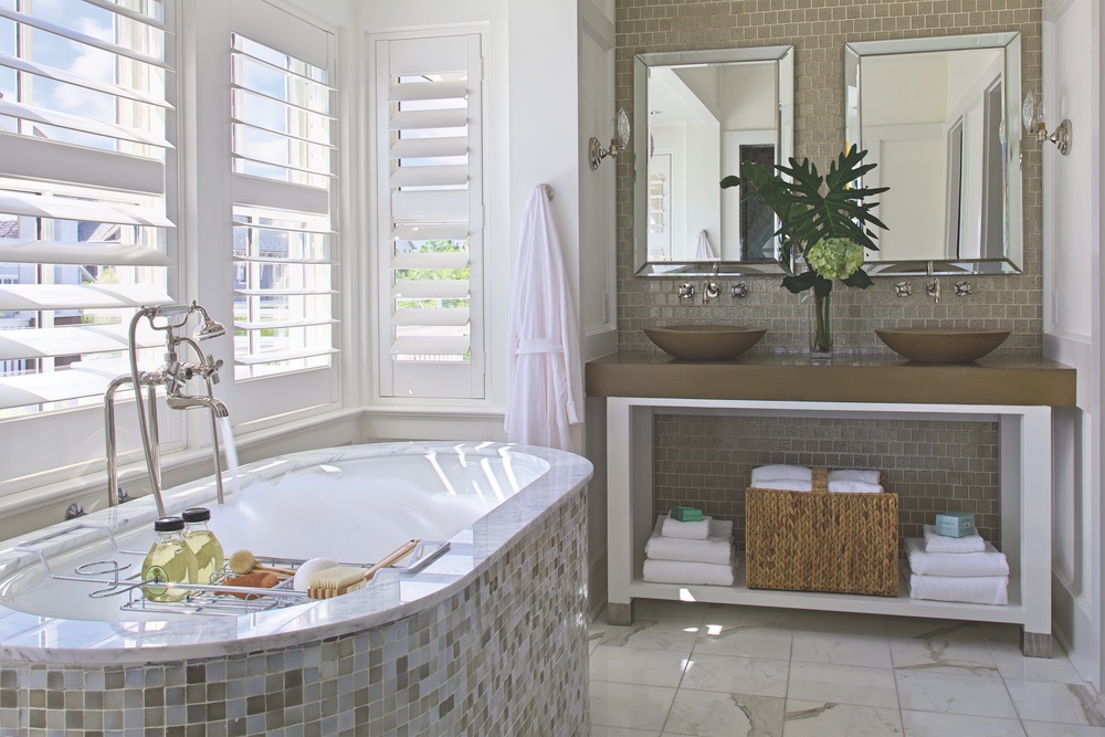 Bathroom and tub of Legacy Home designed by New York Architect John Kirk, residing in WaterSound Beach, Florida VIE Magazine
