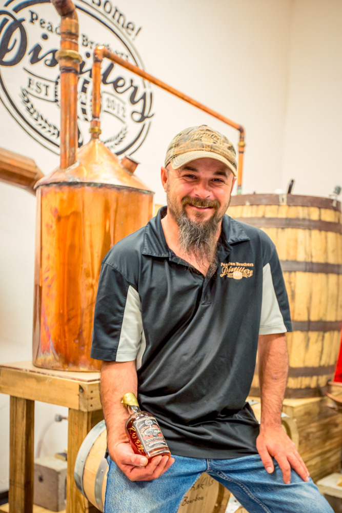 Tyler Peaden, owner and partner of Peaden Brothers Distillery