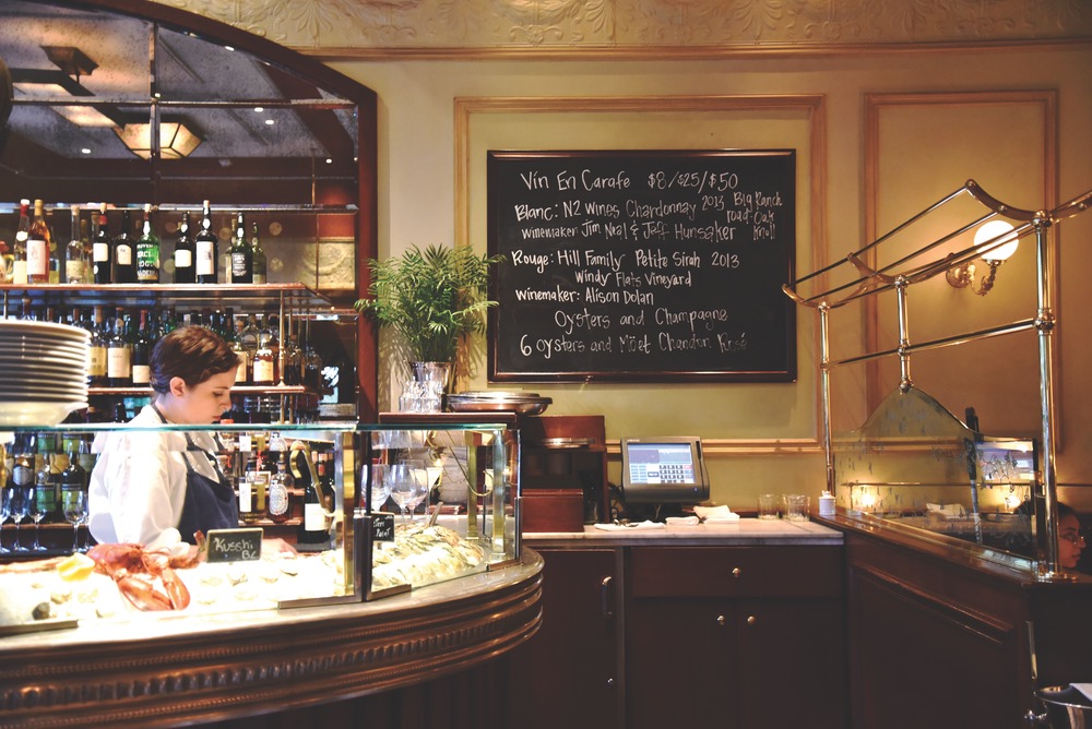 The raw bar and daily specials board at Bouchon