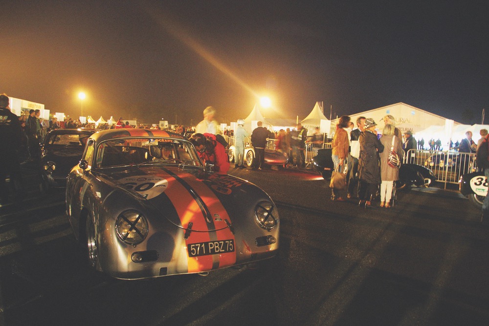 A classic Porsche 356A in the foreground of this photo by Claude Maudoux taken during the early morning hours of pre-race camaraderie. Every two years since 2002, the Le Mans Classic has been the go-to event for historic race car enthusiasts the world over. The July 7, 2012 event hosted almost 450 racers with about 8,000 specimens of vintage classics on display.
