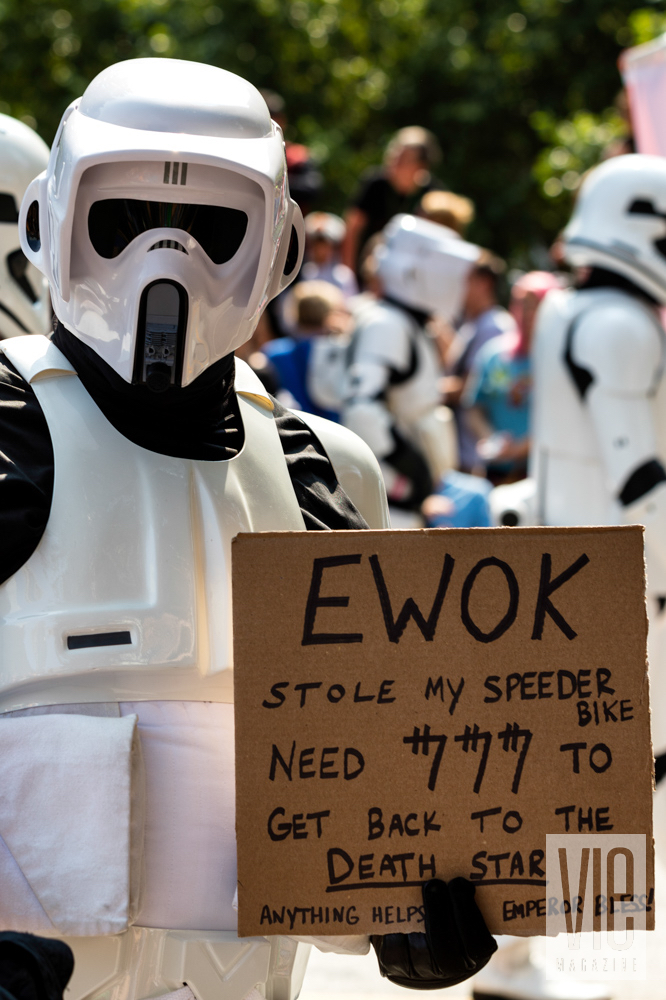 Storm Trooper with sign at Dragon Con