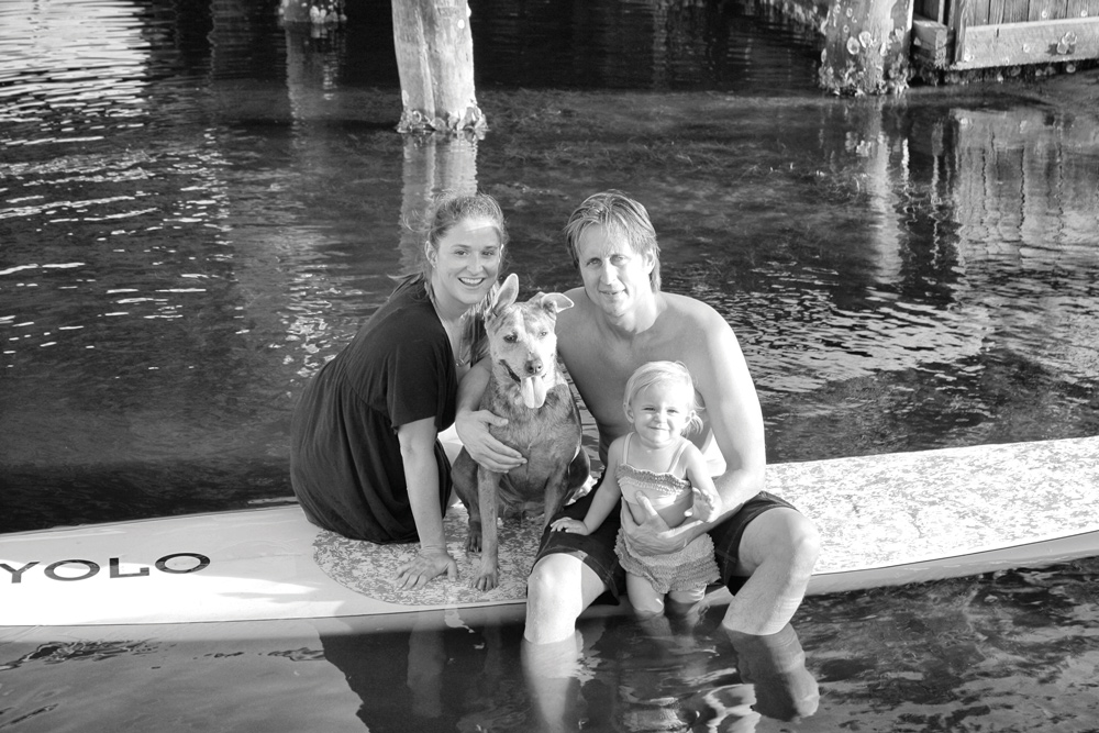 John Finch with his wife, Krissi; their daughter, Lilah; and the family dog, Sky. Photo provided by Sunshine Shuttle and Limousine