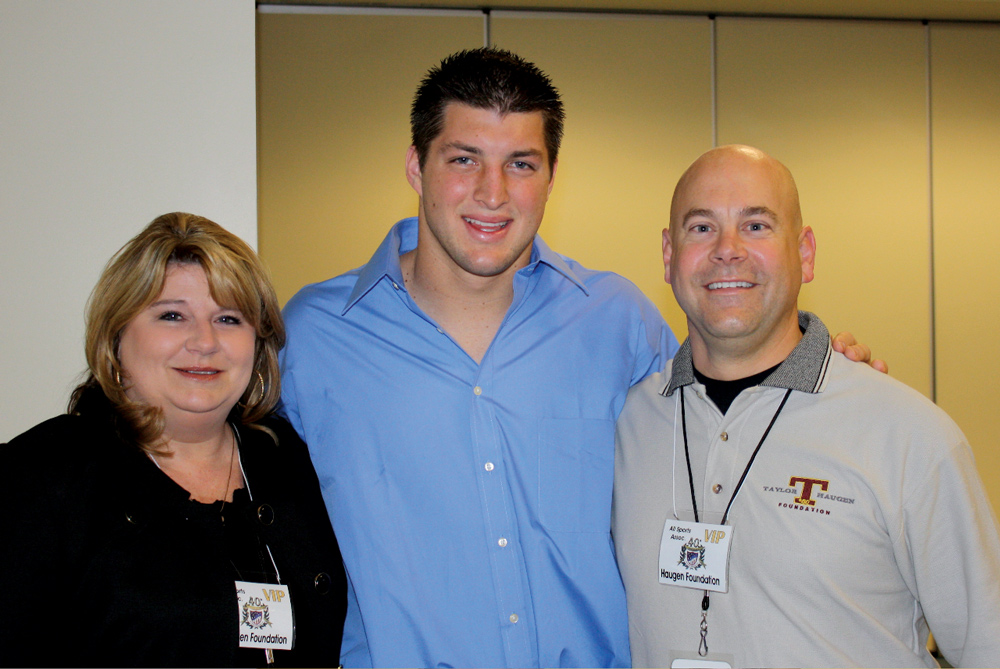 Kathy Haugen, Tim Tebow, Brian Haugen Photo by Philippe Miceli