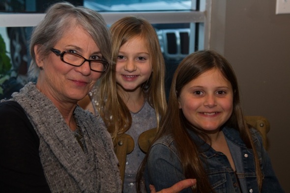 Photographer and artist Marscha Cavaliere with her granddaughters, Laine and Laurel Rockhill