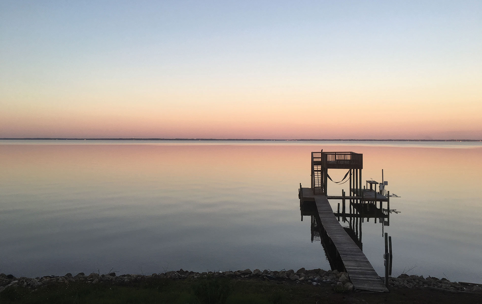 View of the dock and sunset on Florida's Choctawhatchee bay