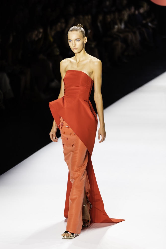 New York Fashion Week 2016 Model Walking Down The Runway in A Cherry Red Monique Lhuillier Evening Dress