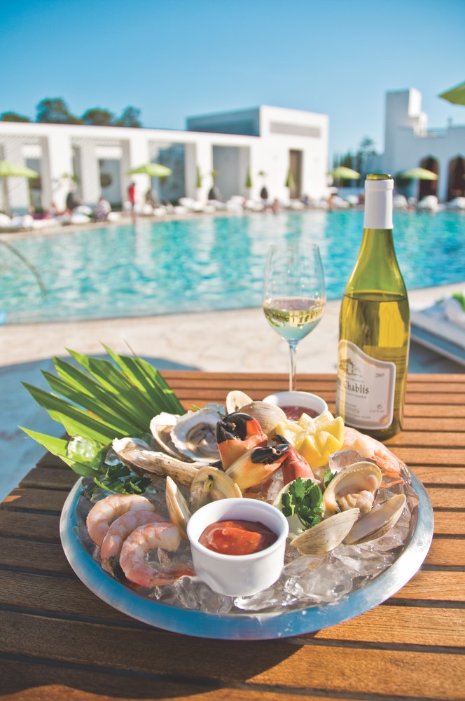 A Mouthwatering Sensation Try the Caliza Platter with Gulf shrimp, oysters, top neck clams and cocktail crab claws beautifully adorned on a large plate.