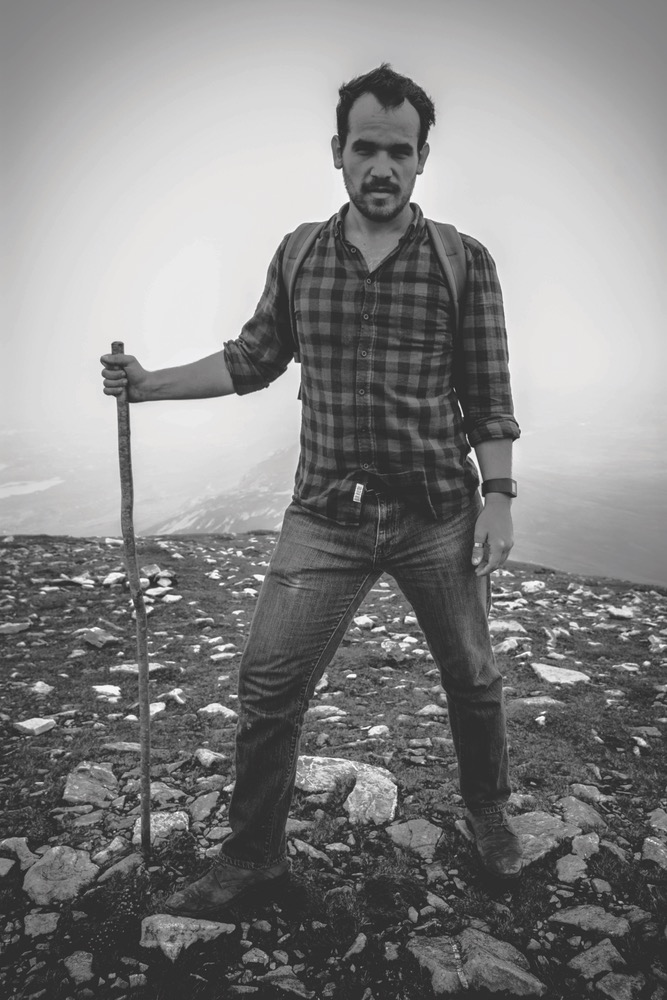 Black and White Image Of A Hike Through The Rocky Road Of Ireland